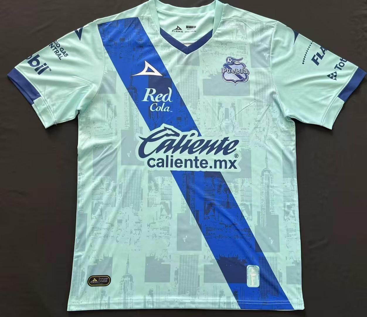 22-23 Puebla third away