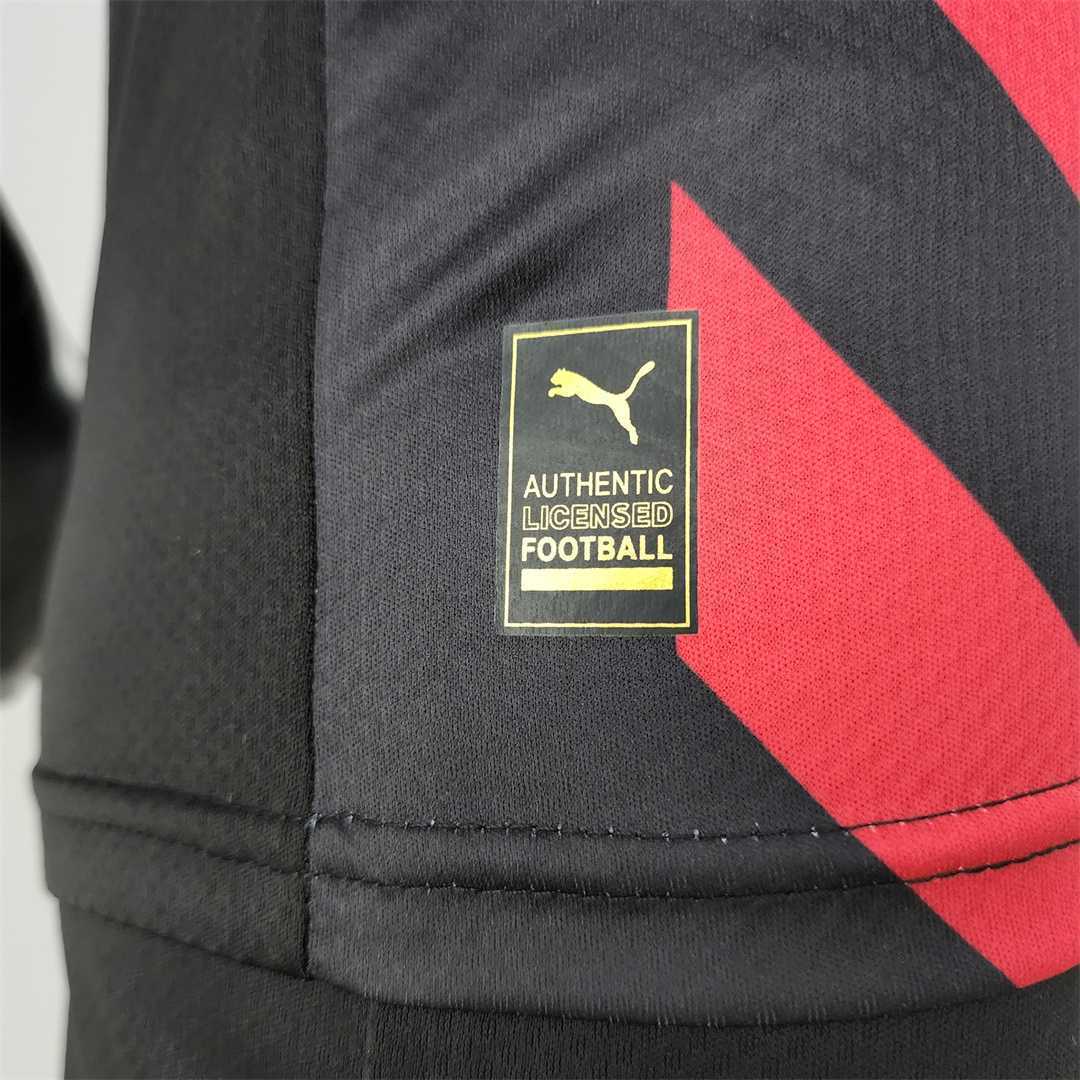 22-23 Manchester City away kids kit 1