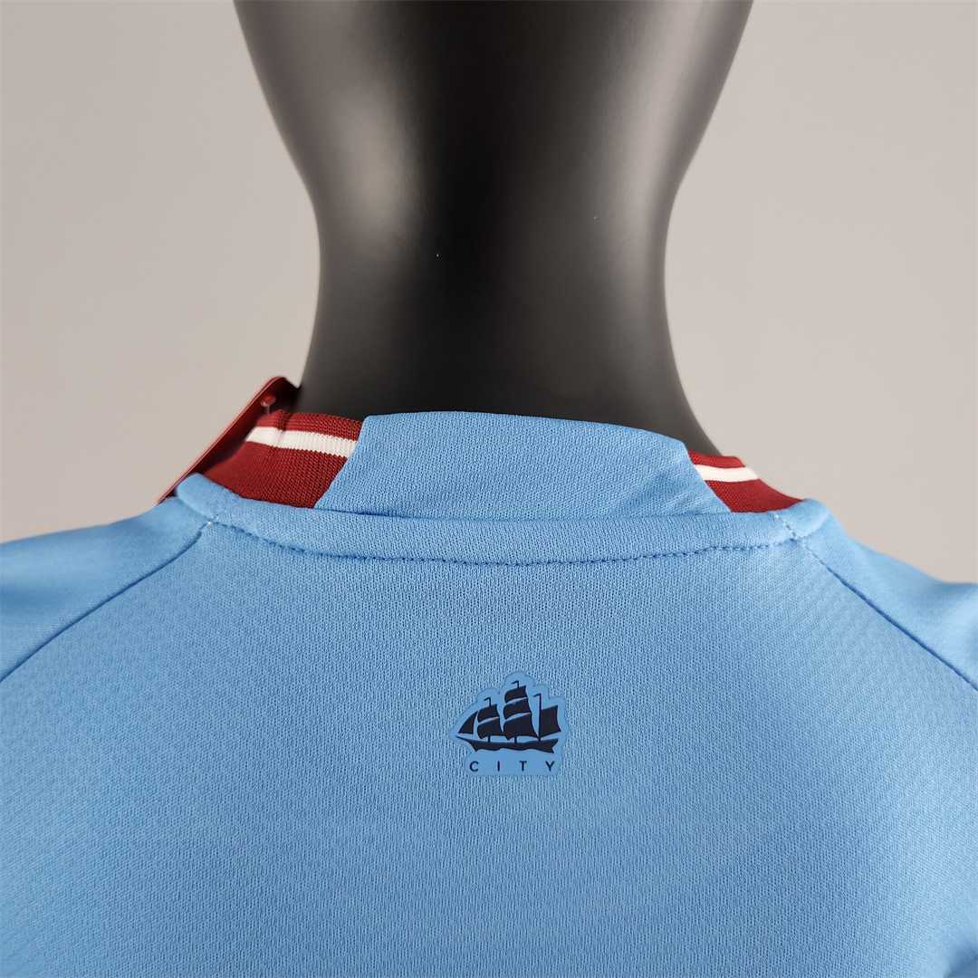 22-23 Manchester City home kids kit 2