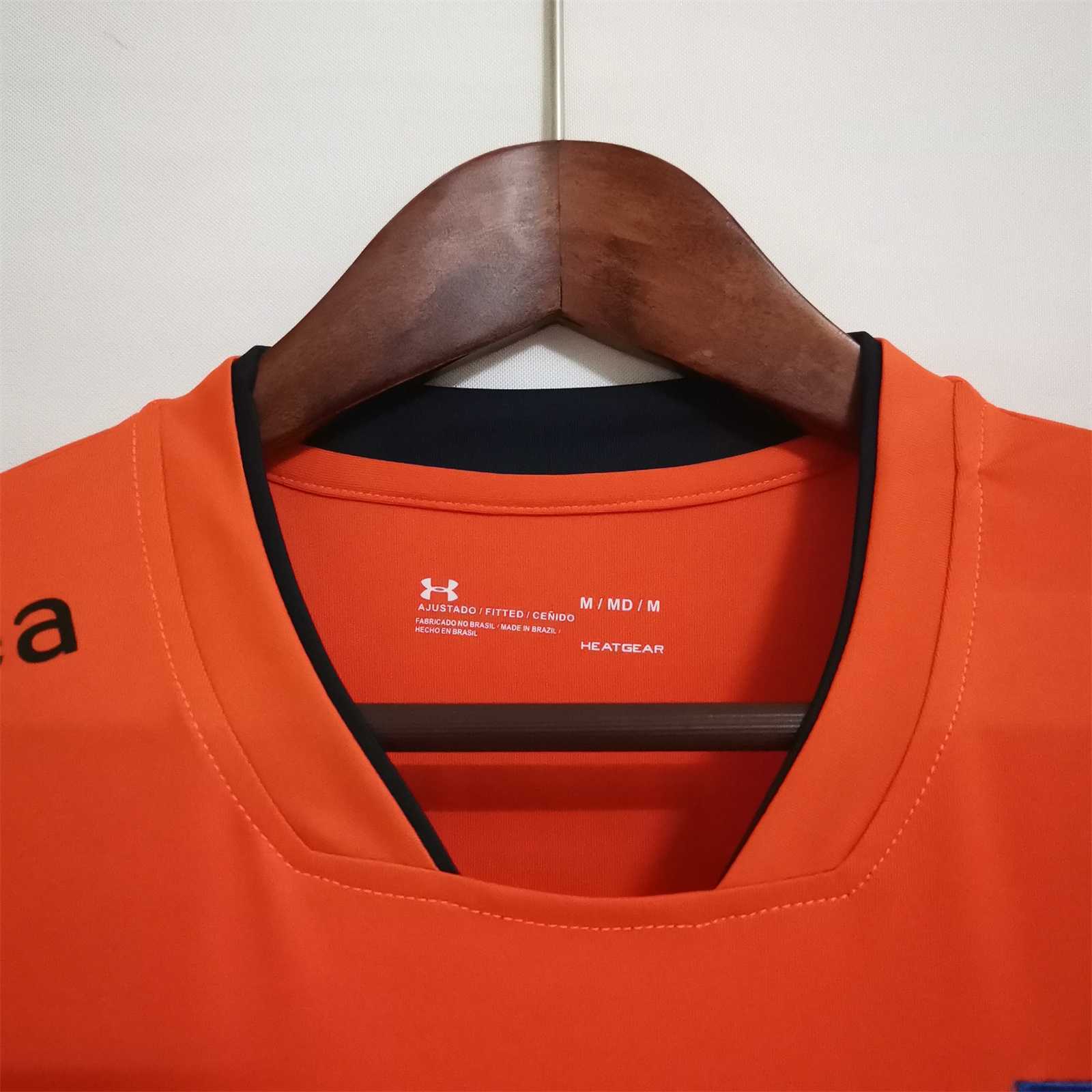 22-23 La Católica orange training suit 7