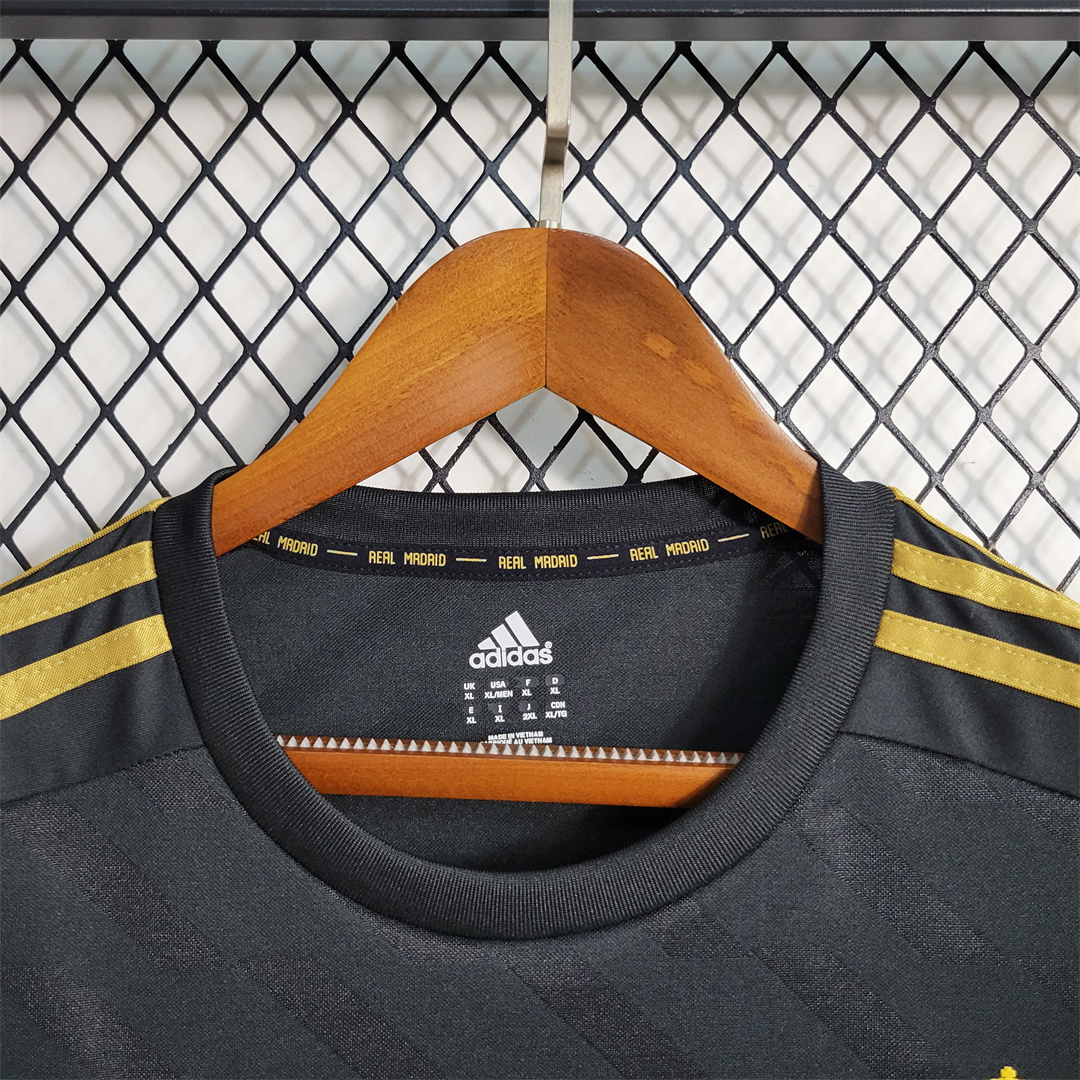 11-12 Real Madrid away black 6