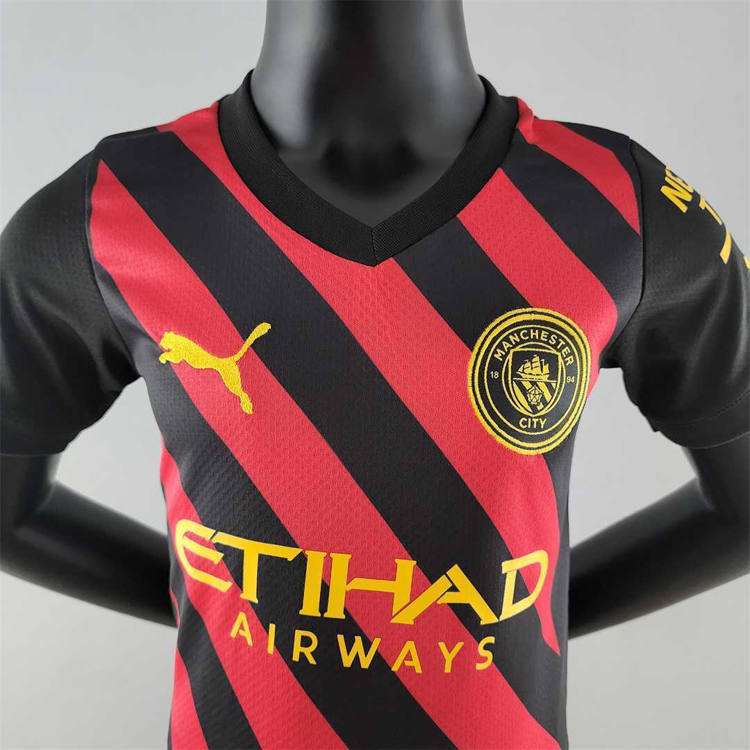 22-23 Manchester City away kids kit 3