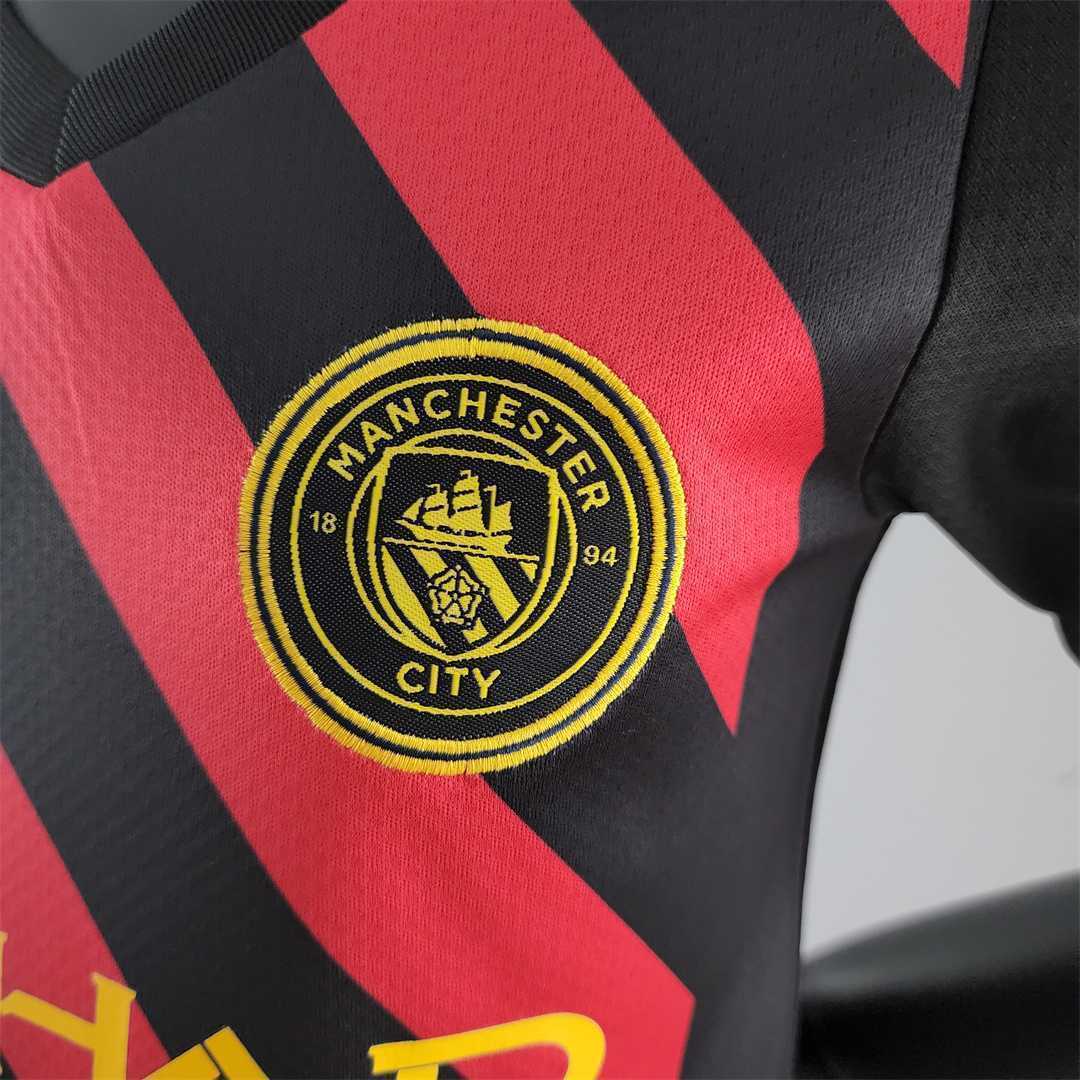 22-23 Manchester City away kids kit 8