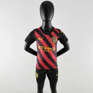 22-23 Manchester City away kids kit