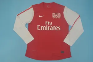11-12 Arsenal home UCL fonts