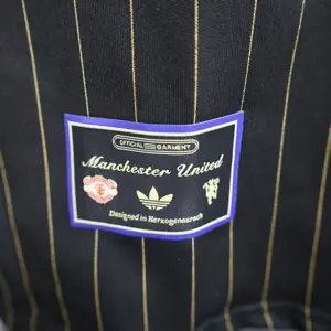 25-26 Manchester United Retro Style Football Black Shirt Apparels AAAAJersey Wholesale Yupoo 1